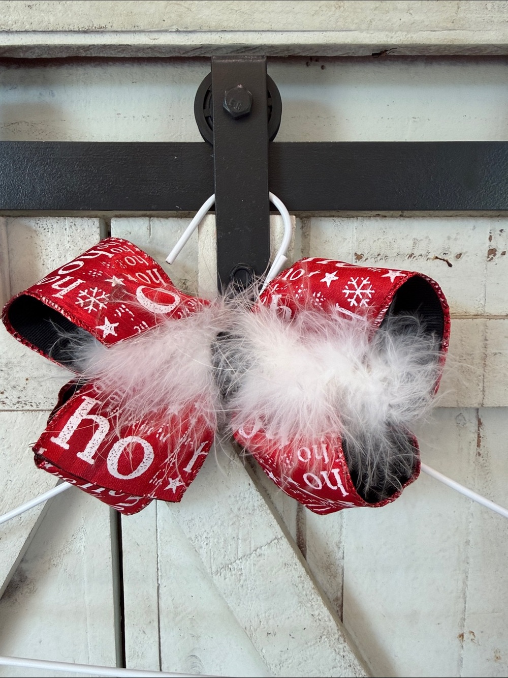 Red Holiday Bow with White Feathers